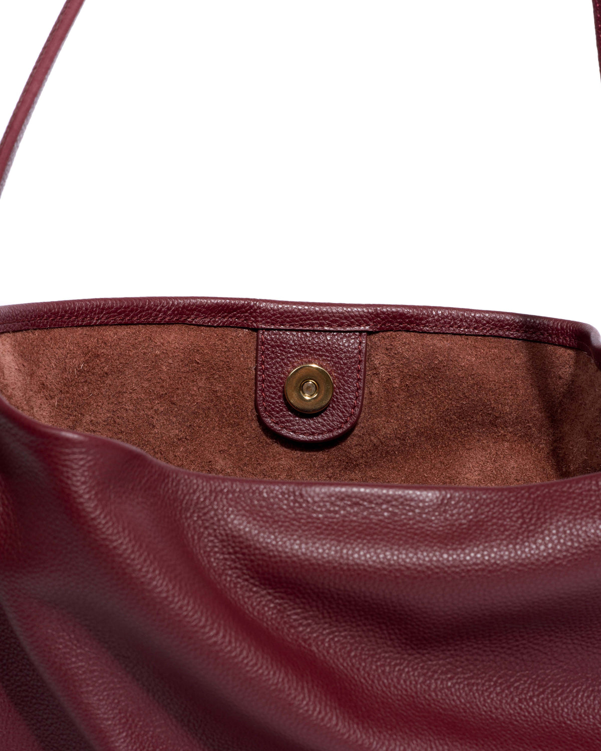 Versa slouchy everyday bag Pebbled soft calf Pomegranate