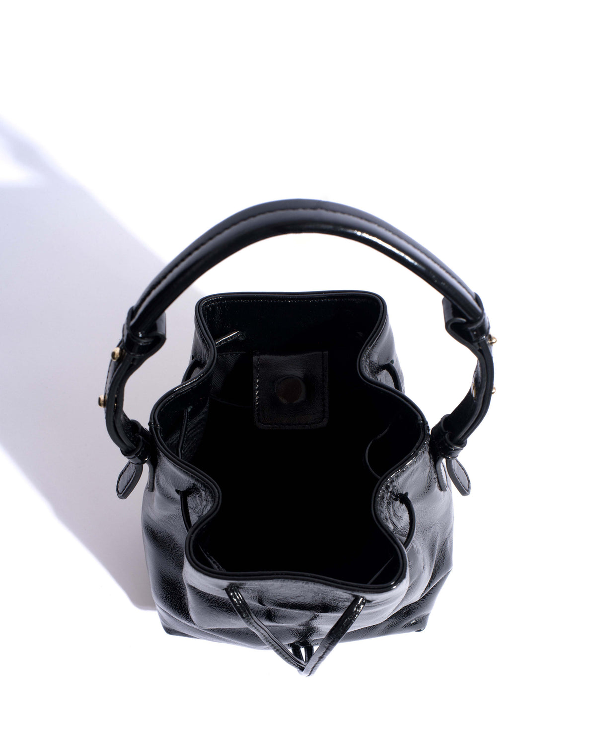Kacey petite bucket bag Crinkled polished goat Black