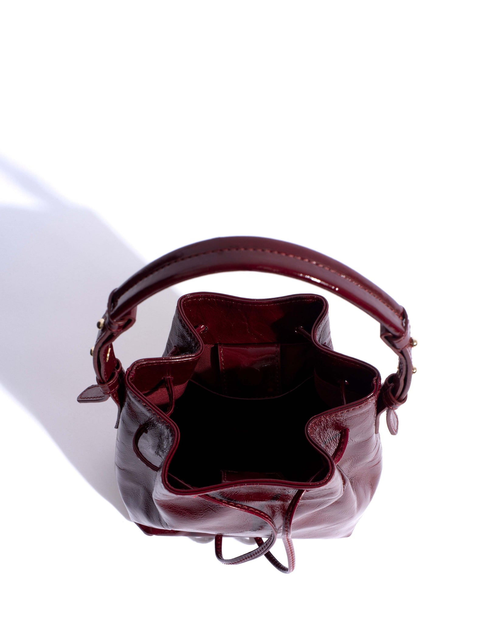 Kacey petite bucket bag Crinkled polished goat Pomegranate - Anonymous Copenhagen Bags