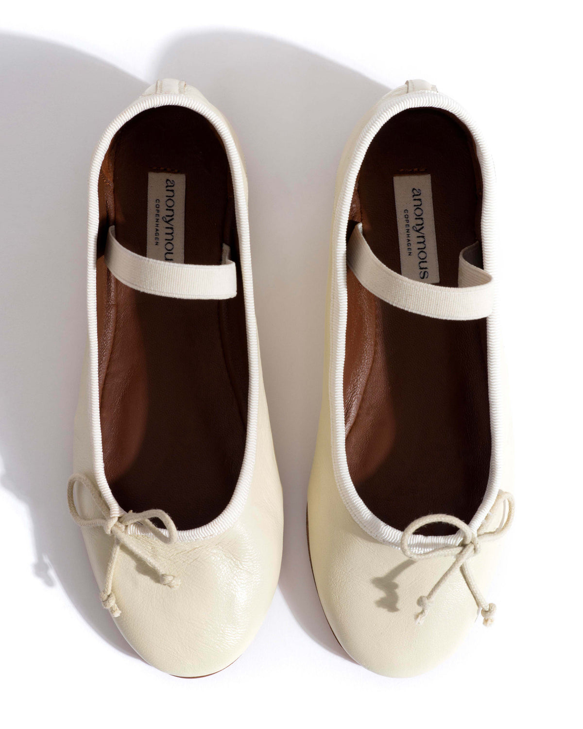 Rhina junior Shiny lamb White sand